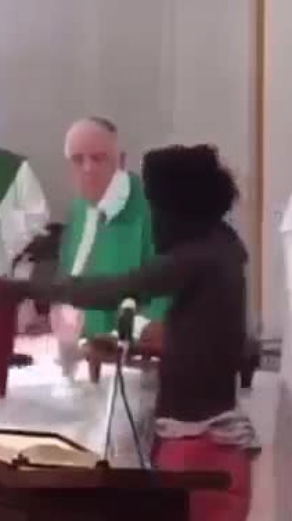 Man knocks priest upside the head